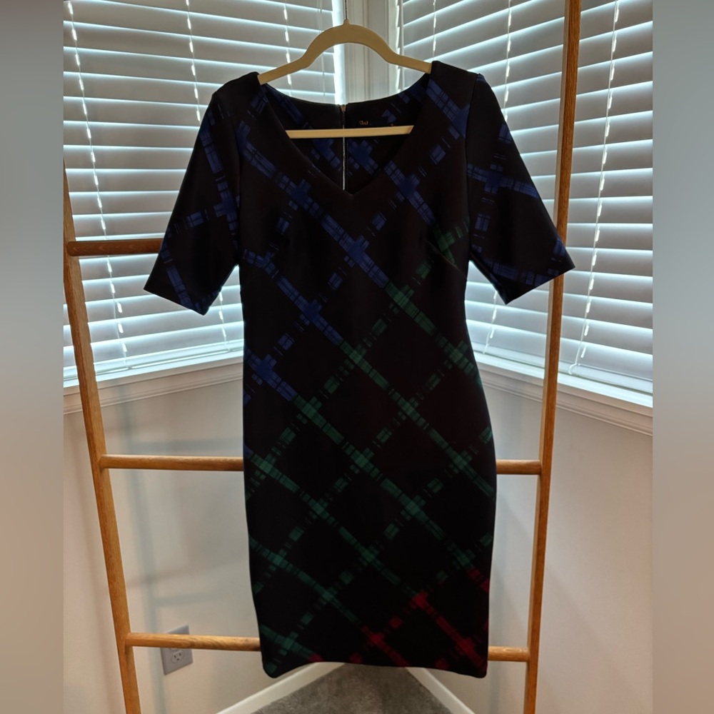 Black dress with red, green and blue pattern